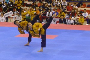 TAEBEK. Marvin Gabriel and Shaneen Sia throw synchronized side kicks in the finals, to win the bronze medal in the junior pair division. CONTRIBUTED PHOTO
