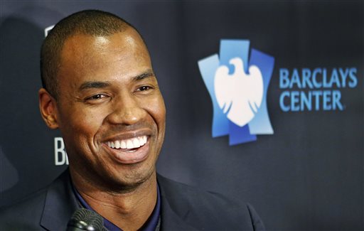 Jason Collins, a 13-year NBA veteran and the NBA's only openly gay player, announces his retirement at a news conference before a basketball game between the Milwaukee Bucks and the Brooklyn Nets on Wednesday, Nov. 19, 2014, in New York.  AP