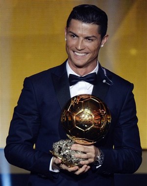Cristiano Ronaldo of Portugal reacts after winning the FIFA Men's soccer player of the year 2014 prize at the FIFA Ballon d'Or awarding ceremony  in Zurich, Switzerland, last  Jan. 12, 2015. AP