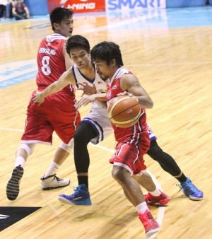 Manny Pacquiao drives to the hoop. Pacquiao scored his first ever point in the PBA.