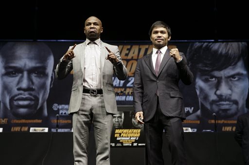 Boxers Floyd Mayweather Jr., left, and Manny Pacquiao, of the Philippines. AP FILE PHOTO 