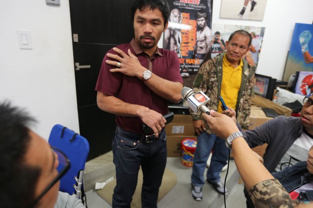 Manny Pacquiao explains his shoulder injury to the media during an interview inside his home in Hollywood, CA on Tuesday, 5 May 2015. PHOTO BY REM ZAMORA/INQUIRER/ See more at FRAME