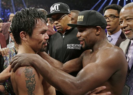 Manny Pacquiao (left) and Floyd Mayweather Jr. AP FILE PHOTO