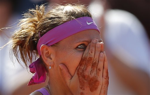 Lucie Safarova of the Czech Republic celebrates winning her semifinal match of the French Open tennis tournament against Serbia's Ana Ivanovic in two sets, 7-5, 7-5, at the Roland Garros stadium, in Paris, France, Thursday, June 4, 2015.  AP PHOTO/FRANCOIS MORI