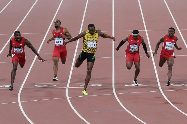 (L-R) USA's Justin Gatlin, USA's Tyson Gay, Jamaica's Usain Bolt, USA's Mike Rodgers and USA's Trayvon Bromell compete in the final of the men's 100 metres athletics event at the 2015 IAAF World Championships at the "Bird's Nest" National Stadium in Beijing on August 23, 2015.  AFP PHOTO / PEDRO UGARTE