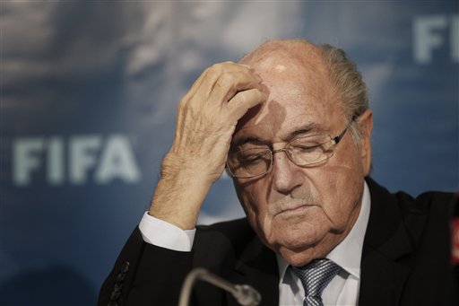 In this Dec. 19, 2014 file photo Fifa President Sepp Blatter gestures as he attends a press conference in Marrakech, Morocco. On Friday, Sept. 25, 2015 Swiss attorney general opened criminal proceedings against FIFA President Sepp Blatter. AP
