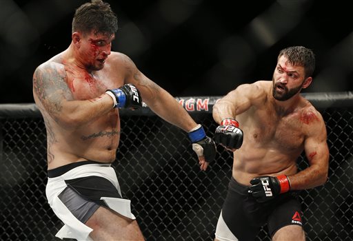 Andrei Arlovski, right, fights Frank Mir during their heavyweight mixed martial arts bout at UFC 191 on Saturday, Sept. 5, 2015, in Las Vegas. AP FILE PHOTO
