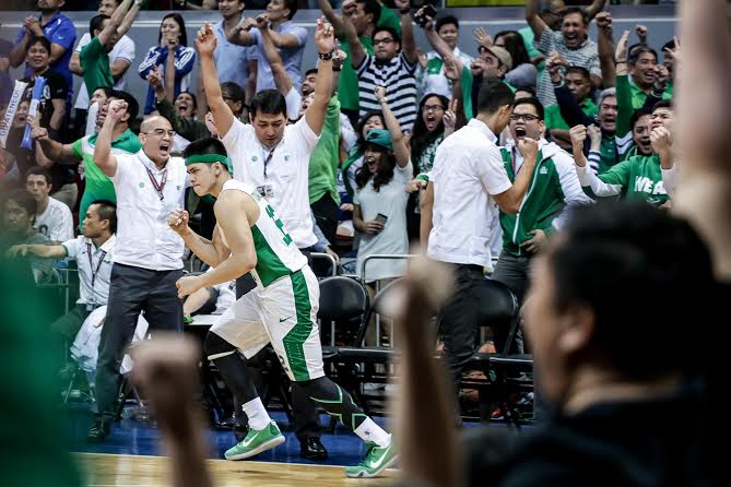 La Salle's Josh Torralba pumps his fist after knocking down the go-ahead triple late in the Green Archers' 80-76 win over the Ateneo Blue Eagles Sunday night. Tristan Tamayo/INQUIRER.net