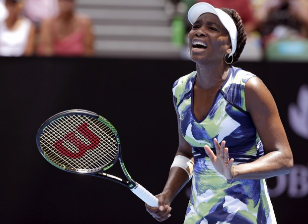 Venus Williams of the United States reacts to a lost point against Johanna Konta of Britain during their first round match at the Australian Open tennis championships in Melbourne, Australia, Tuesday, Jan. 19, 2016.(AP Photo/Aaron Favila)