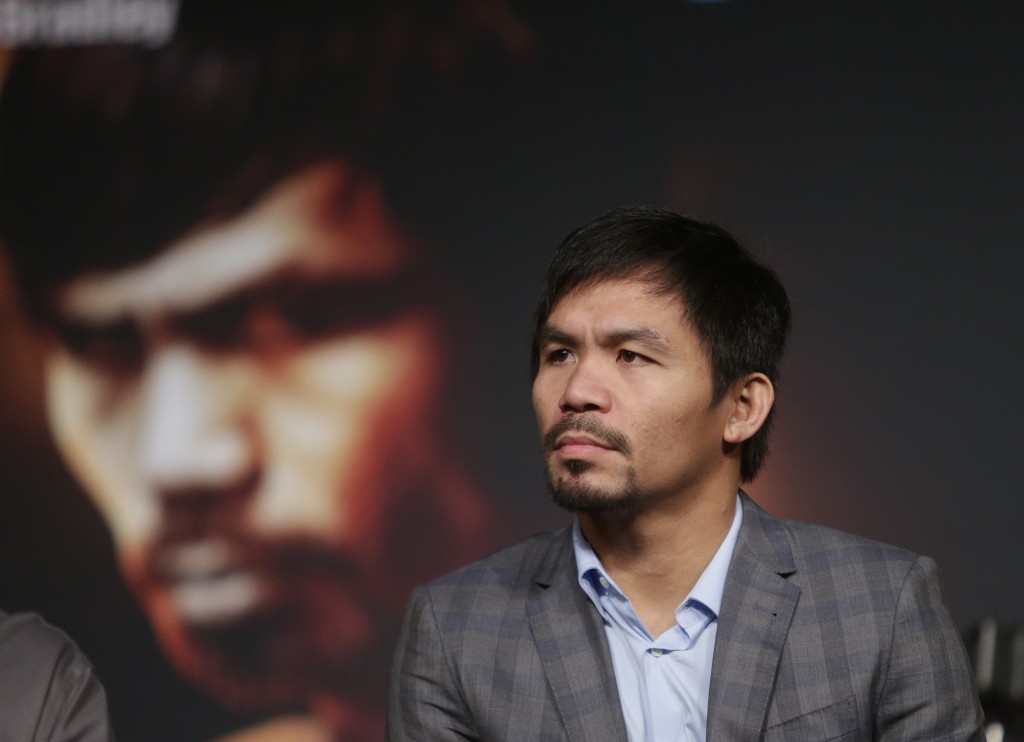 Manny Pacquiao listens during a news conference to promote an upcoming boxing match Thursday, Jan. 21, 2016, in New York. Pacquiao is scheduled to fight Timothy Bradley on April 9, 2016,  in Las Vegas.  (AP Photo/Frank Franklin II)
