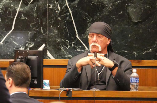 Terry Bollea, known as professional wrestler Hulk Hogan, listens while testifying in his case against the news website Gawker at the Pinellas County Courthouse, in St. Petersburg, Fla., Monday, March 7, 2016. Hogan is suing Gawker for $100 million for publishing a video of him having sex with his best friend's wife. (Boyzell Hosey/Tampa Bay Times via AP, Pool)