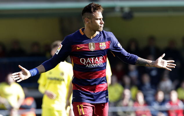 Barcelona's Neymar celebrates after scoring during the Spanish La Liga soccer match between Villarreal and Barcelona at the Madrigal stadium in Villarreal, Spain, Sunday, March 20, 2016. AP
