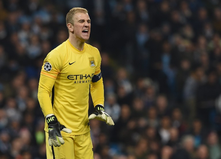 Manchester City's English goalkeeper Joe Hart shouts during the UEFA Champions league quarter-final second leg football match between Manchester City and Paris Saint-Germain at the Etihad stadium in Manchester on April 12, 2016. AFP