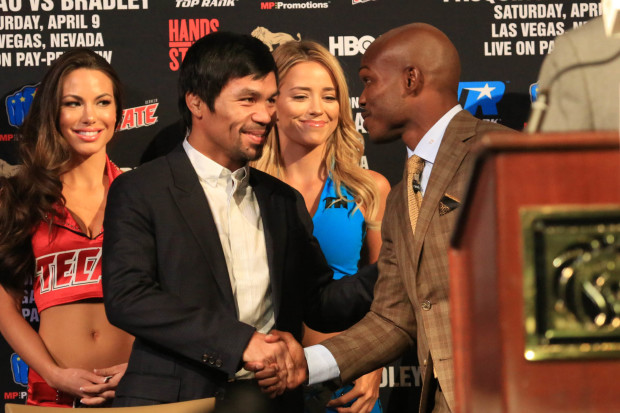 Manny Pacquiao greets Timothy Bradley Jr. upon arrival at the David Copperfield Theater inside MGM Hotel in Las Vegas for the final press conference, April 6, 2016. Pacquiao and Bradley is set to fight on Saturday (Sunday Philippine time.)     PHOTO BY REM ZAMORA