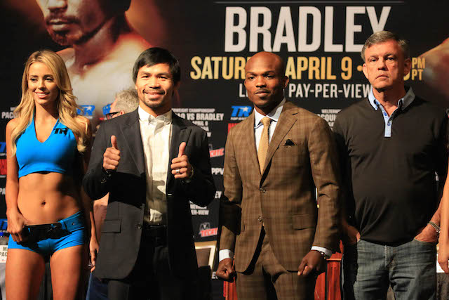 Manny Pacquiao and Timothy Bradley Jr. pose for photos during their final press conference at the David Copperfield Theater inside MGM Hotel in Las Vegas. Pacquiao and Bradley fight for the third time on April 10, Sunday (Manila time). PHOTO BY REM ZAMORA