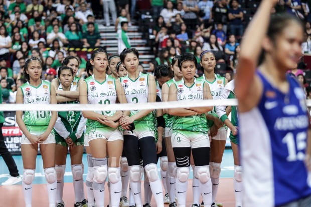 La Salle Lady Spikers look on as Ateneo celebrates game 2 in. Photo by Tristan Tamayo/INQUIRER.net