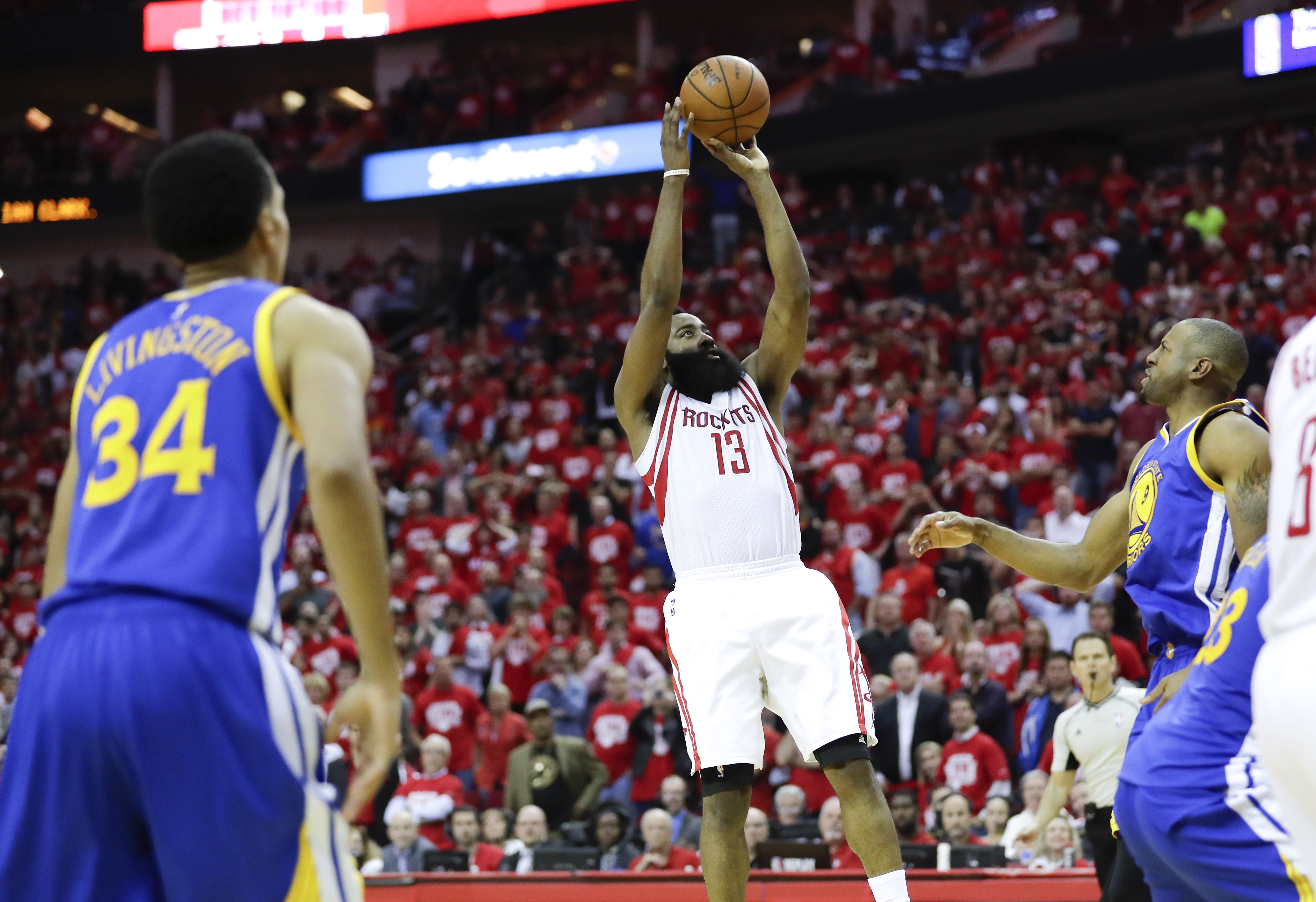 Houston Rockets guard James Harden scores the winning basket during the second half in Game 3 of a first-round NBA basketball playoff series against the Golden State Warriors, Thursday, April 21, 2016, in Houston. AP