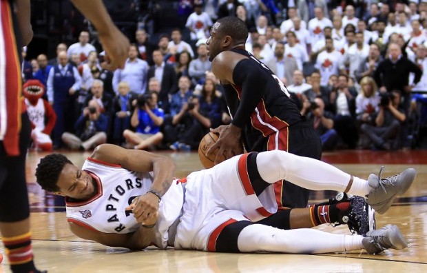 DeMar DeRozan #10 of the Toronto Raptors injures his hand late in the second half of Game One of the Eastern Conference Semifinals against the Miami Heat during the 2016 NBA Playoffs at the Air Canada Centre on May 3, 2016 in Toronto, Ontario, Canada. NOTE TO USER: User expressly acknowledges and agrees that, by downloading and or using this photograph, User is consenting to the terms and conditions of the Getty Images License Agreement.   Vaughn Ridley/Getty Images/AFP