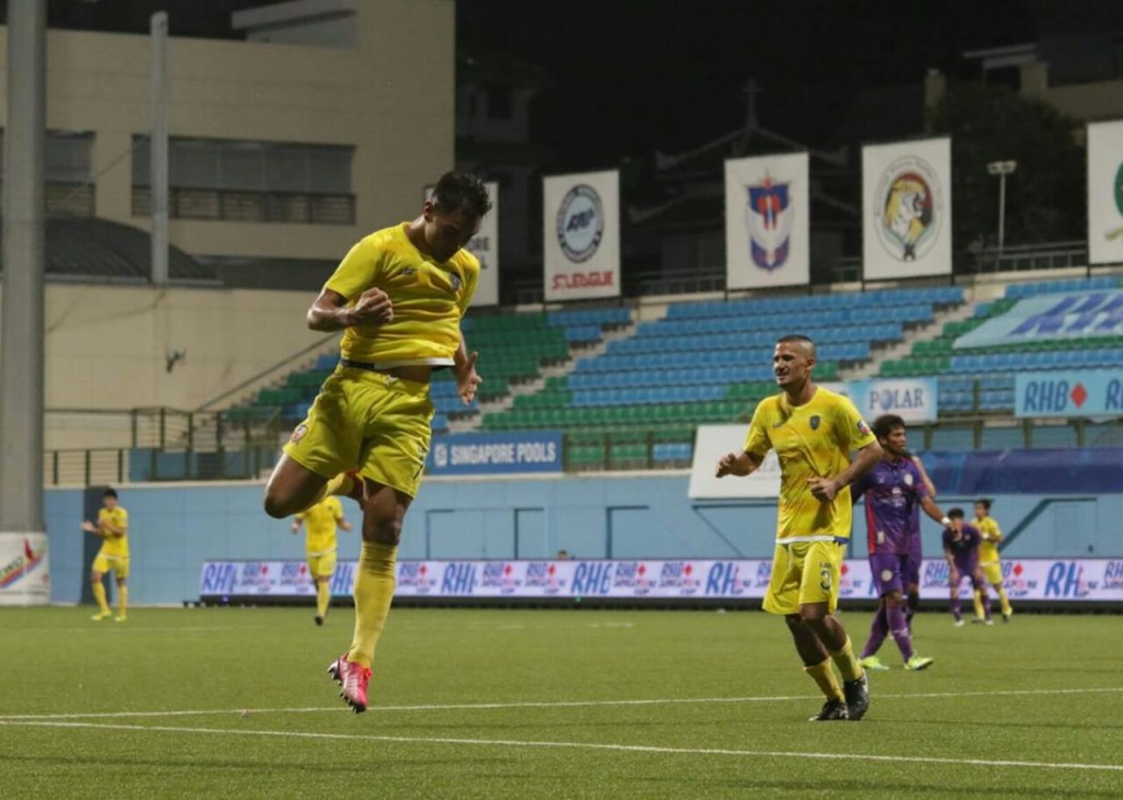 Omid Nazari celebrates his goal for Global against Nagaworld in the Singapore Cup.