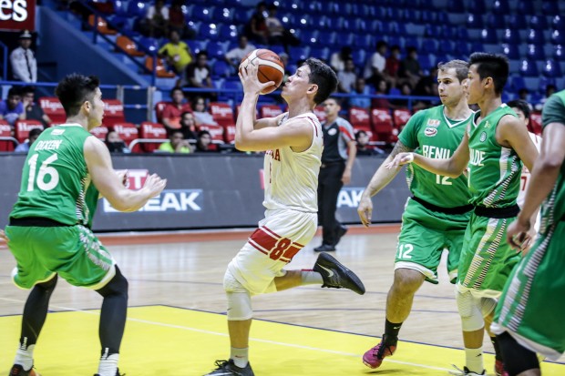 San Beda's Robert Bolick attacks the basket against College of St. Benilde in the first round of the NCAA Season 92 men's basketball tournament. Photo by Tristan Tamayo/INQUIRER.net