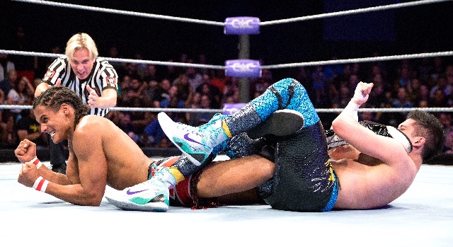 Fil-Am star TJ Perkins (right) made Germany's Da Mack tap out to his kneebar to advance to the second round of the WWE Cruiserweight Classic. Photo by WWE.com 