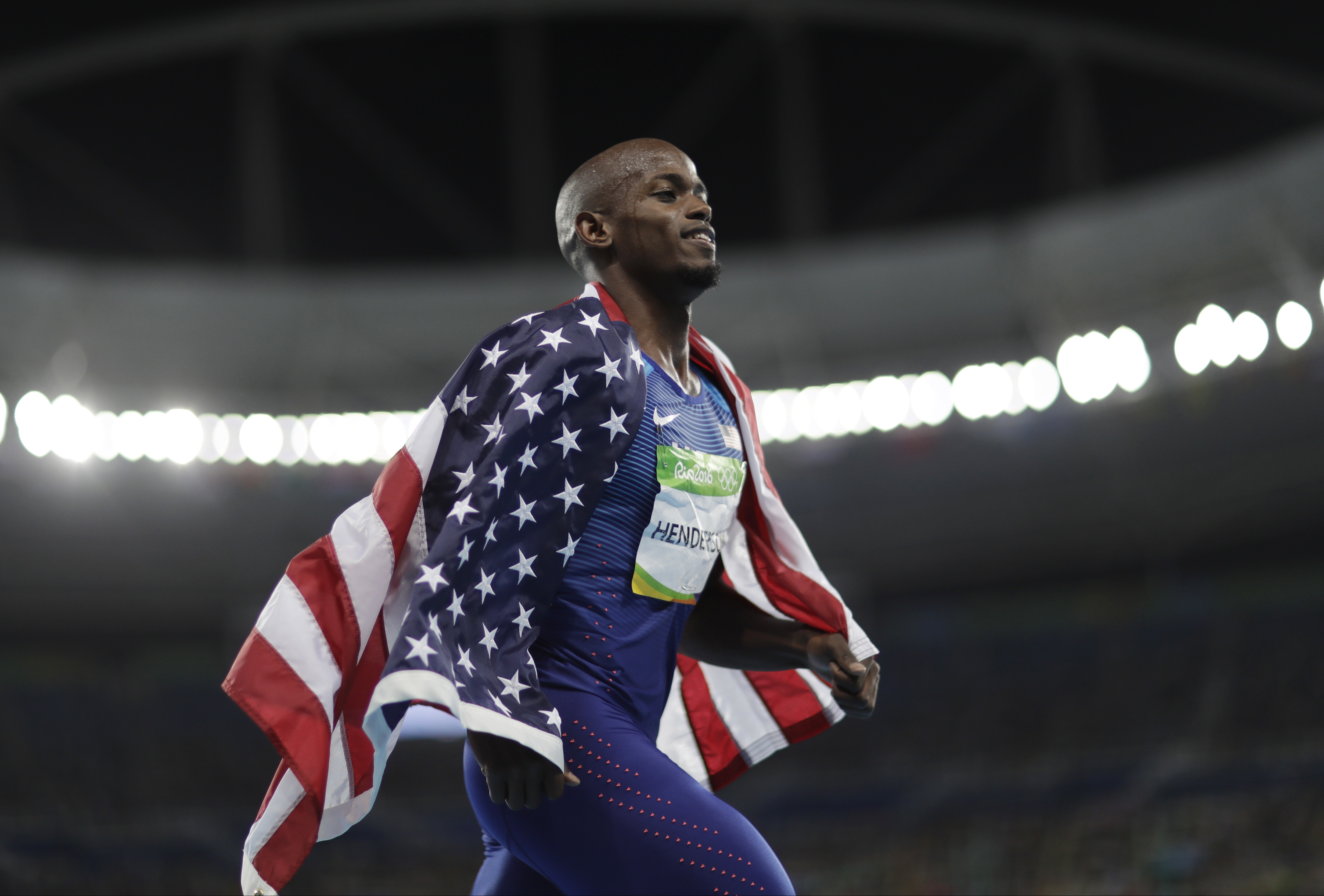 United States' Jeff Henderson celebrates winning the gold medal in the men's long jump during the athletics competitions of the 2016 Summer Olympics at the Olympic stadium in Rio de Janeiro, Brazil, Saturday, Aug. 13, 2016. AP