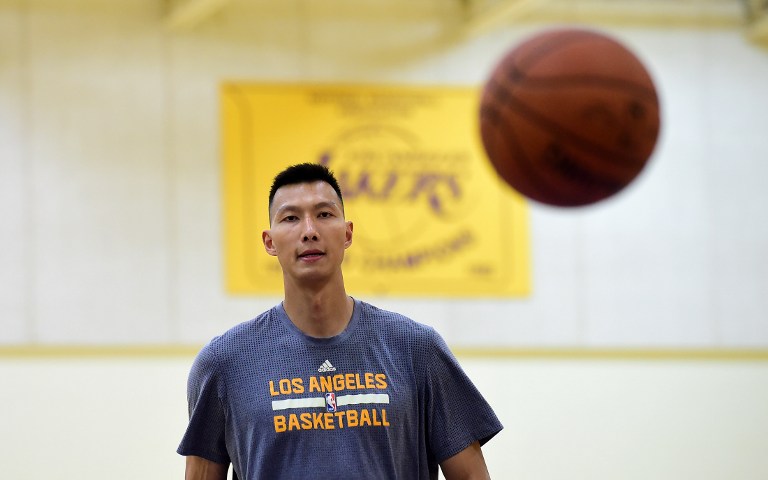 Chinese basketball player Yi Jianlian works out at his introduction as a member of the NBA Los Angeles Lakers in El Segundo, California, on September 16, 2016. / AFP PHOTO / Frederic J. BROWN / The erroneous mention[s] appearing in the metadata of this photo by Frederic J. BROWN has been modified in AFP systems in the following manner: [El Segundo, California] instead of [Los Angeles]. Please immediately remove the erroneous mention[s] from all your online services and delete it (them) from your servers. If you have been authorized by AFP to distribute it (them) to third parties, please ensure that the same actions are carried out by them. Failure to promptly comply with these instructions will entail liability on your part for any continued or post notification usage. Therefore we thank you very much for all your attention and prompt action. We are sorry for the inconvenience this notification may cause and remain at your disposal for any further information you may require.