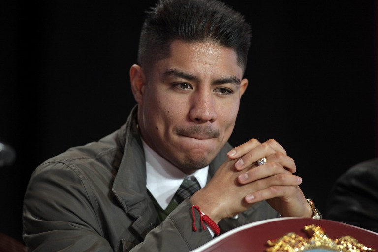 Boxer Jessie Vargas of the US, looks on during a news conference at The Wynn Las Vegas on November 2, 2016.  Manny Pacquiao of the Philippines will challenge Vargas for the WBO Welterweight Championship November 5, 2016, at the Thomas & Mack Center in Las Vegas.  / AFP PHOTO / John GURZINSKI