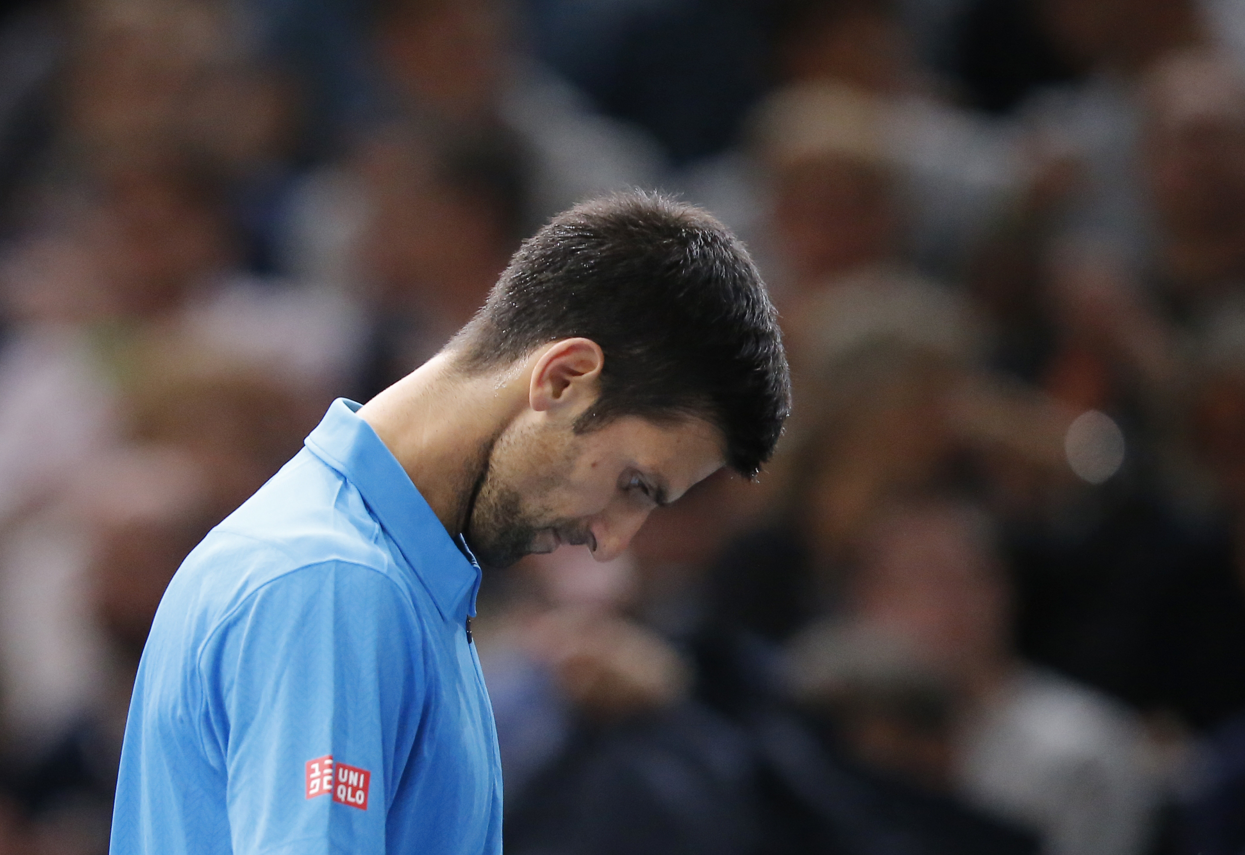 Novak Djokovic of Serbia reacts after loosing a point against Marin Cilic of Croatia during the quarterfinal match of the Paris Masters tennis tournament at the Bercy Arena in Paris, Friday, Nov. 4, 2016. Cilic won 6-4, 7-6. (AP Photo/Michel Euler)