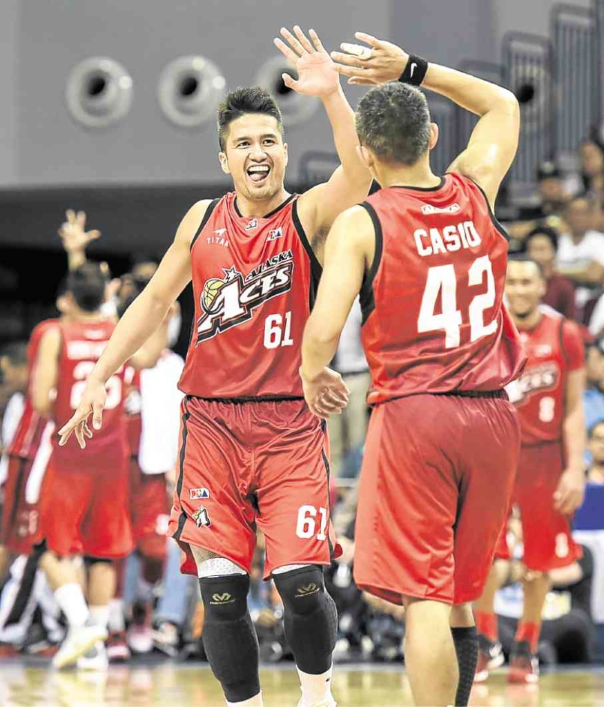 Kevin Racal (left), JVee Casio and the rest of the Alaska Aces have been enjoying quite a run the past few games. —Sherwin Vardeleon 