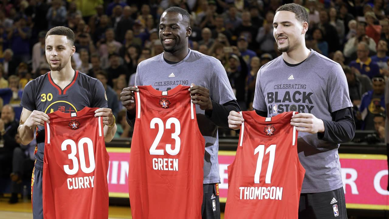 Golden State Warriors' Stephen Curry, Draymond Green, and Klay Thompson display their All Star Game jerseys on Tuesday, Feb. 9, 2016, in Oakland, Calif. AP