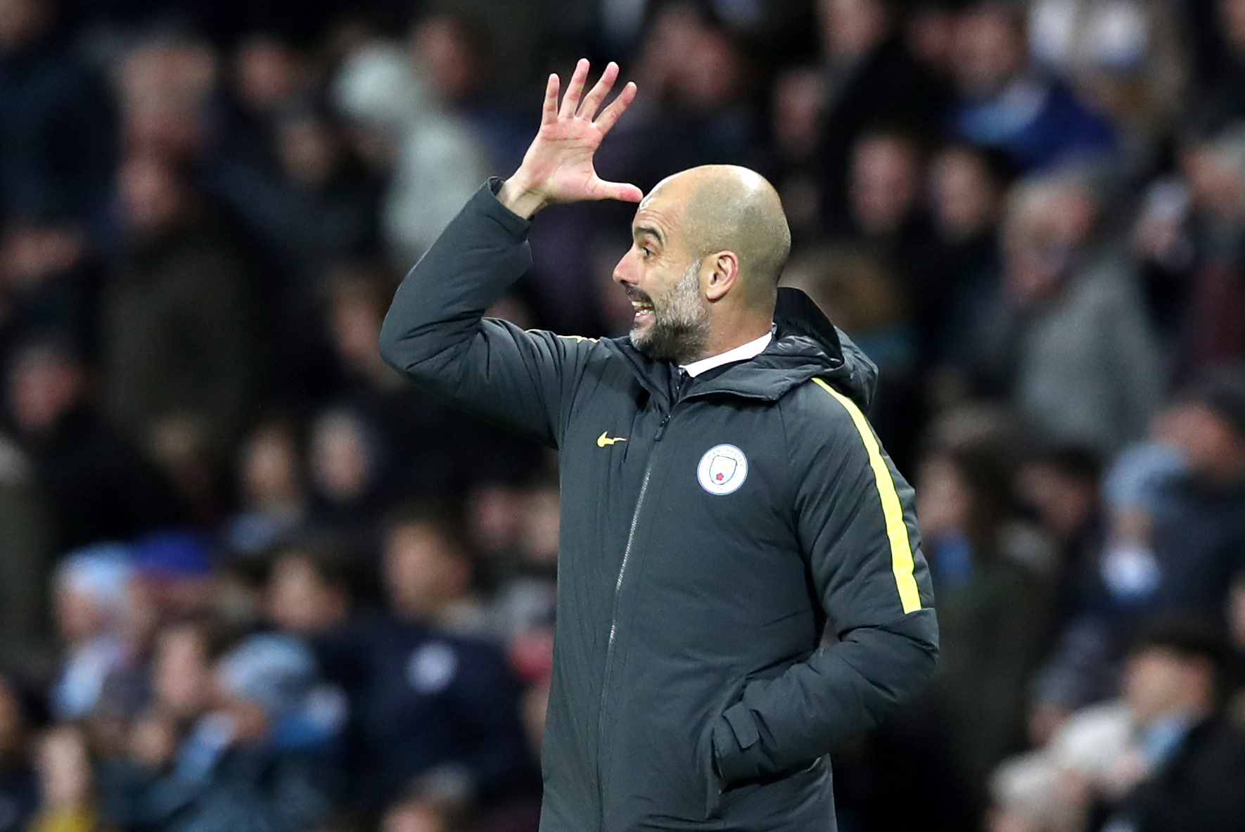 Manchester City's manager Pep Guardiola gestures on the touchline, during the English Premier League soccer match between Manchester City and Burnley, at the Etihad Stadium, in Manchester, England, Monday, Jan. 2, 2017. AP
