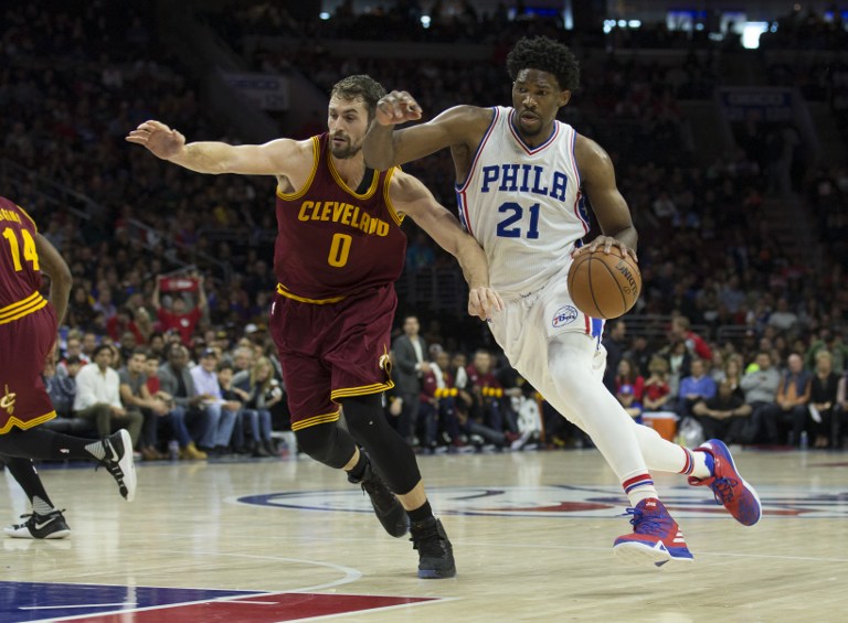 PHILADELPHIA, PA - NOVEMBER 27: Joel Embiid #21 of the Philadelphia 76ers drives to the basket against Kevin Love #0 of the Cleveland Cavaliers in the first quarter at Wells Fargo Center on November 27, 2016 in Philadelphia, Pennsylvania. NOTE TO USER: User expressly acknowledges and agrees that, by downloading and or using this photograph, User is consenting to the terms and conditions of the Getty Images License Agreement.   Mitchell Leff/Getty Images/AFP
