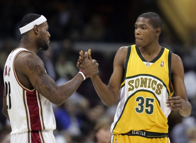 FILE - In this Jan. 8, 2008, file photo, Cleveland Cavaliers’ LeBron James, left, greets Seattle Supersonics’ rookie Kevin Durant (35) before an NBA basketball game, in Cleveland. LeBron James and Kevin Durant have squared off 23 times, with James holding an 18-5 edge. (AP Photo/Mark Duncan, File)