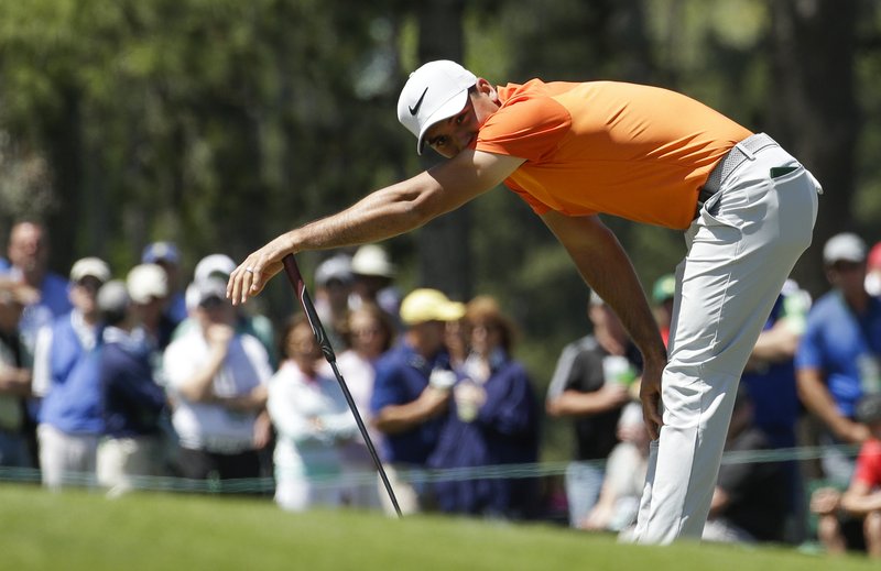 FILE - In this April 8, 2017, file photo, Jason Day, of Australia, reacts after missing a putt on the 17th hole during the third round of the Masters golf tournament, in Augusta, Ga. Day has slipped to No. 3 in the world and has gone an entire year without winning. (AP Photo/Charlie Riedel, File)