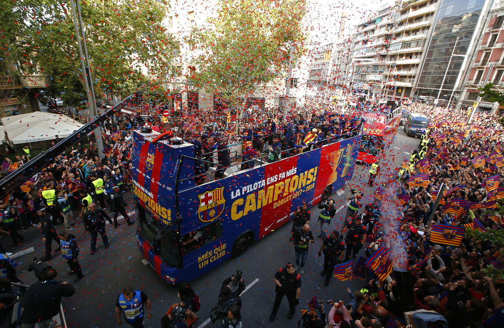 Barcelona celebrates La Liga triumph in city parade