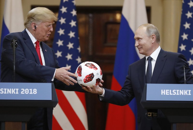 Soccer diplomacy: World Cup host Putin gives Trump a ball