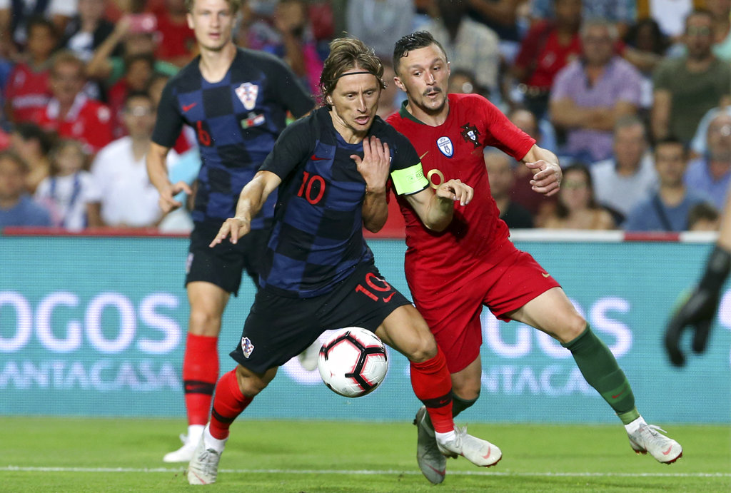 Without Ronaldo, Portugal draws with Modric's Croatia