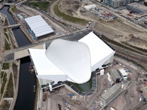2012 OLYMPICS COUNTDOWN.  With exactly a year to go until the start of the London 2012 Games, the Olympic Delivery Authority has announced that the Aquatics Center is now complete, the last of the six main permanent Olympic Park venues to finish construction. AP