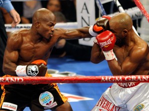 (L-R) Timothy Bradley throws a left to the head of Joel Casamayor during their WBO junior welterweight title fight at the MGM Grand Garden Arena in Las Vegas, Nevada on November 12, 2011 . AFP/ ETHAN MILLER