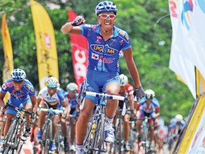 RUDY Roque punches the air in delight after ruling Stage 5 in Tacloban City. ANDREW TADALAN
