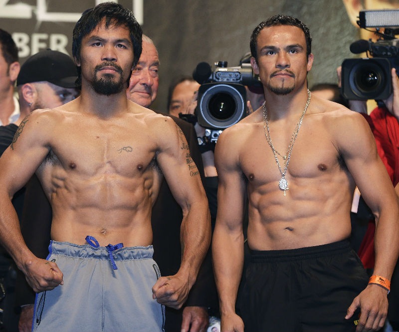 Manny Pacquiao and Juan Manuel Marquez. AP File Photo