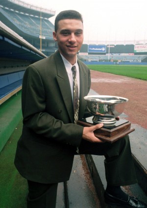 - In this Sept. 14, 1994 file photo, New York Yankees shortstop prospect Derek Jeter poses on the dugout steps at Yankee Stadium in New York after he was named Baseball America's minor league player of the year. The 20-year-old from Kalamazoo, Mich., finished the season at Triple-A in Columbus, Ohio. A five-time World Series champion and sixth on the career hits list, Jeter, now 40, is set to retire after this season after spending two decades as the shortstop for the Yankees. AP