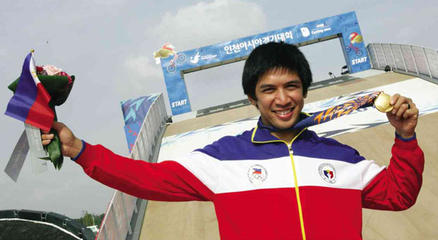 FIRST PHILIPPINE GOLD     Daniel Patrick Caluag finally strikes gold for the Philippines on Wednesday by winning the men’s BMX race at the Ganghwa Asiad BMX Track during the 17th Asian Games in Incheon, South Korea.   NIÑO JESUS ORBETA