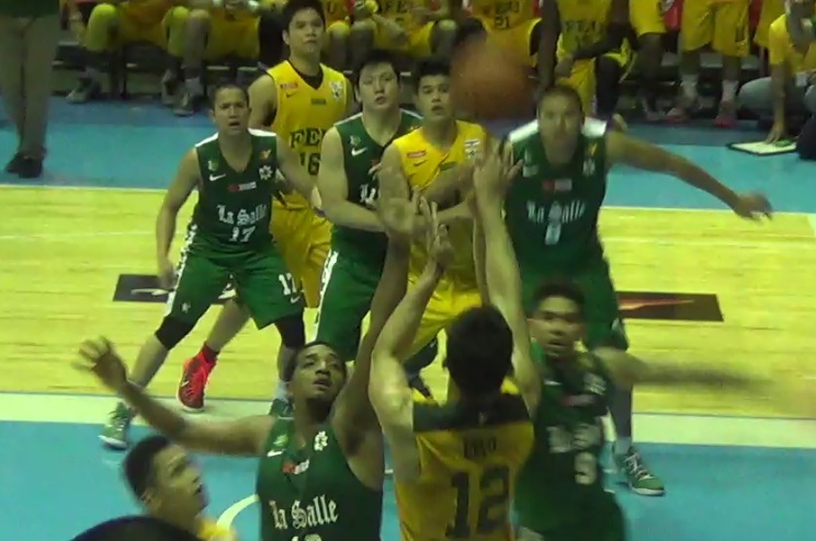 Mac Belo of FEU sinks his winning three-point shot at the buzzer. NOY MORCOSO lll/INQUIRER.net