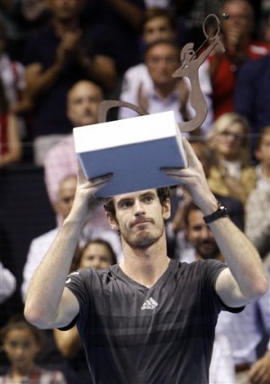 Andy Murray displays his trophy after winning the final match against Tommy Robredo from Spain, at ATP 500 World Tour Valencia Open tennis tournament at the agora building of the Ciudad de las Artes y las Ciencias in Valencia, Spain, Sunday, Oct. 26, 2014. AP 