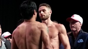 Manny Pacquiao and Chris Algieri stare down at each other during their official weigh-in Saturday at The Venetian in Macau. Top Rank