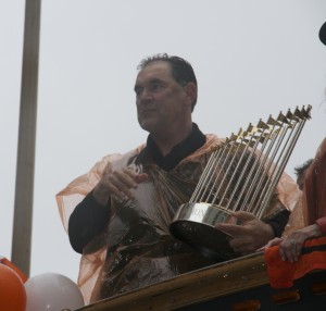 Giants manager Bruce Bochy with World Series trophy.
