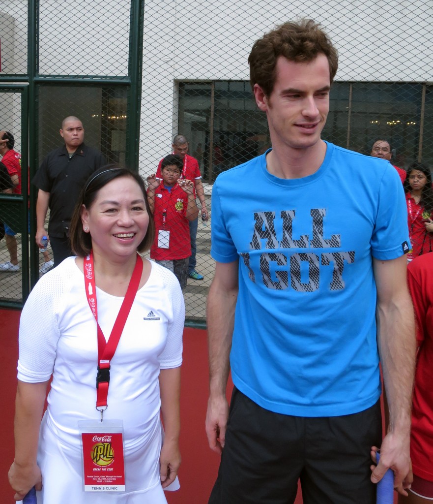 The author poses with tennis champion Andy Murray