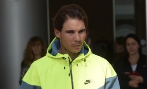 Spanish tennis player Rafael Nadal leaves the hospital after successfully undergoing an operation to remove his appendix in Barcelona, Spain, Wednesday, Nov 5, 2014. AP 